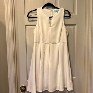 Pleated white v-neck dress